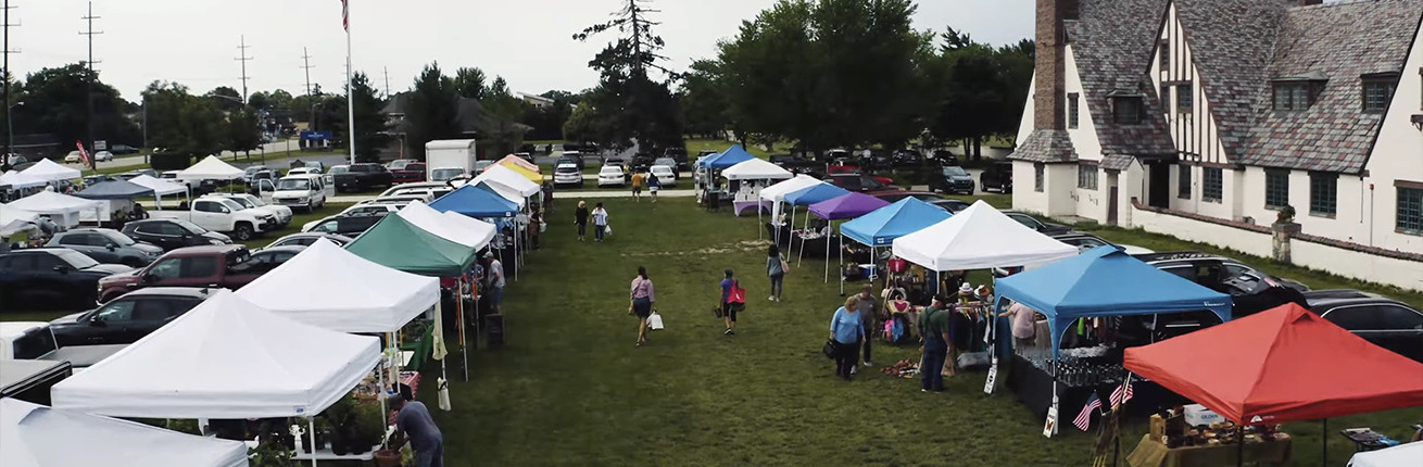 Discover the charm of Shelby Twp Farmers Market nestled in the historic Packard Proving Grounds, open for a unique shopping experience every Saturday.